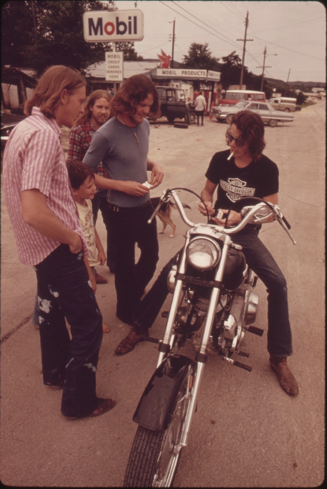 Motorcyclist from Leakey, Texas, stops to talk with friends near San Antonio, May 1973. 